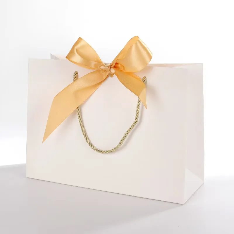 Custom Luxury Gift Paper Bags Embossed Logo Shopping Packaging